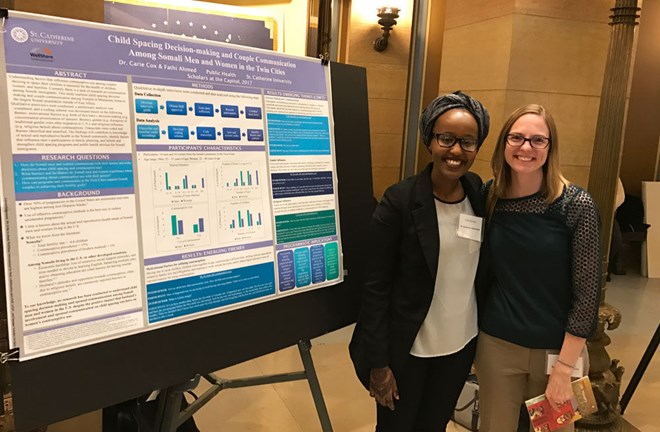 Fathi Ahmed ’17 and Public Health Professor Carie Cox presented their research at the Minnesota State Capitol as part of the 2017 Minnesota Private College Scholars Showcase. Photo by Lynda Szymanski